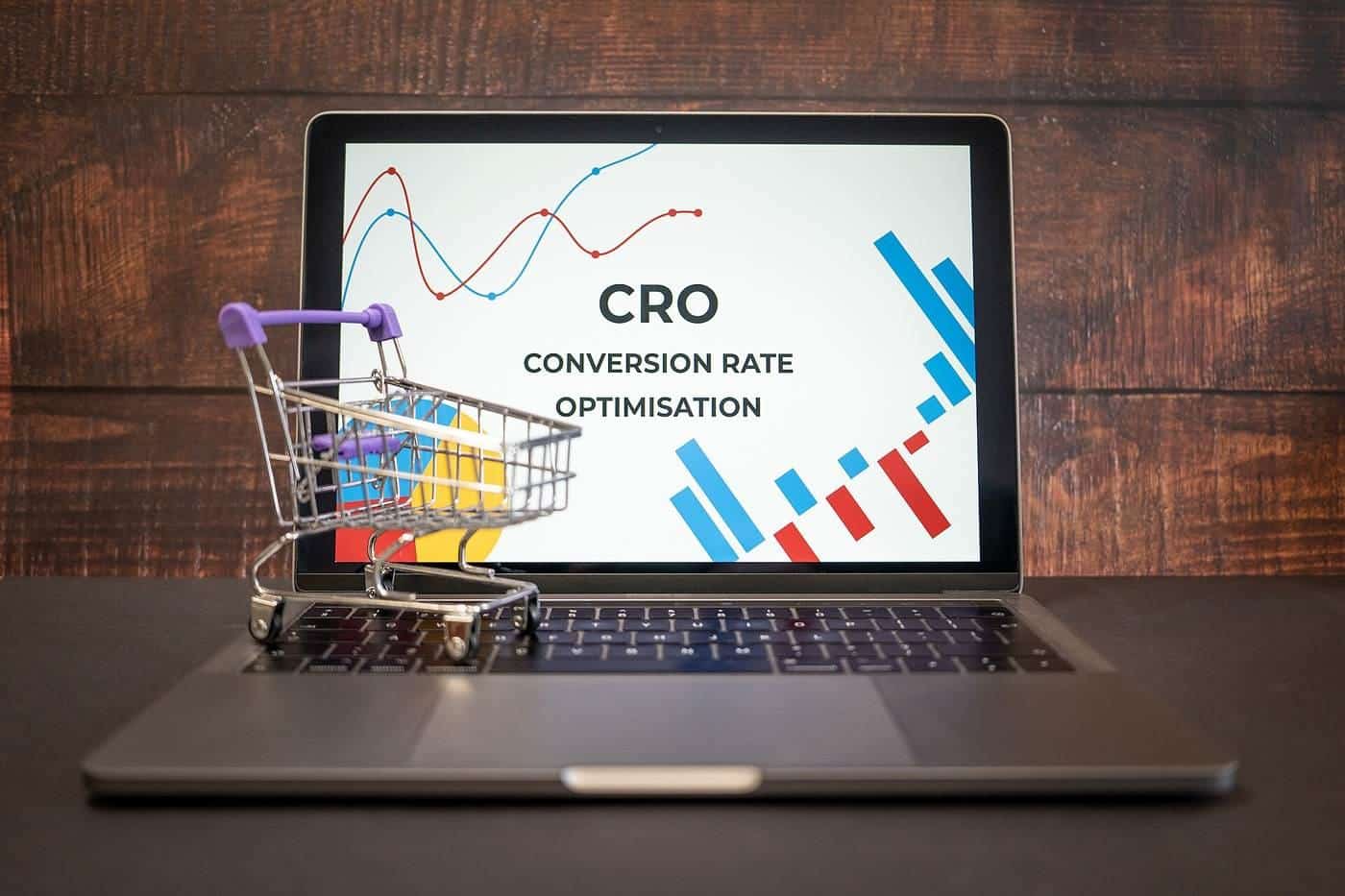 A laptop on a desk showing an ecommerce analytics concept screen
